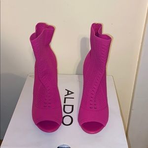 Hot pink open-toe boots